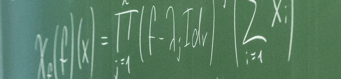 Mathematical formulas on a blackboard